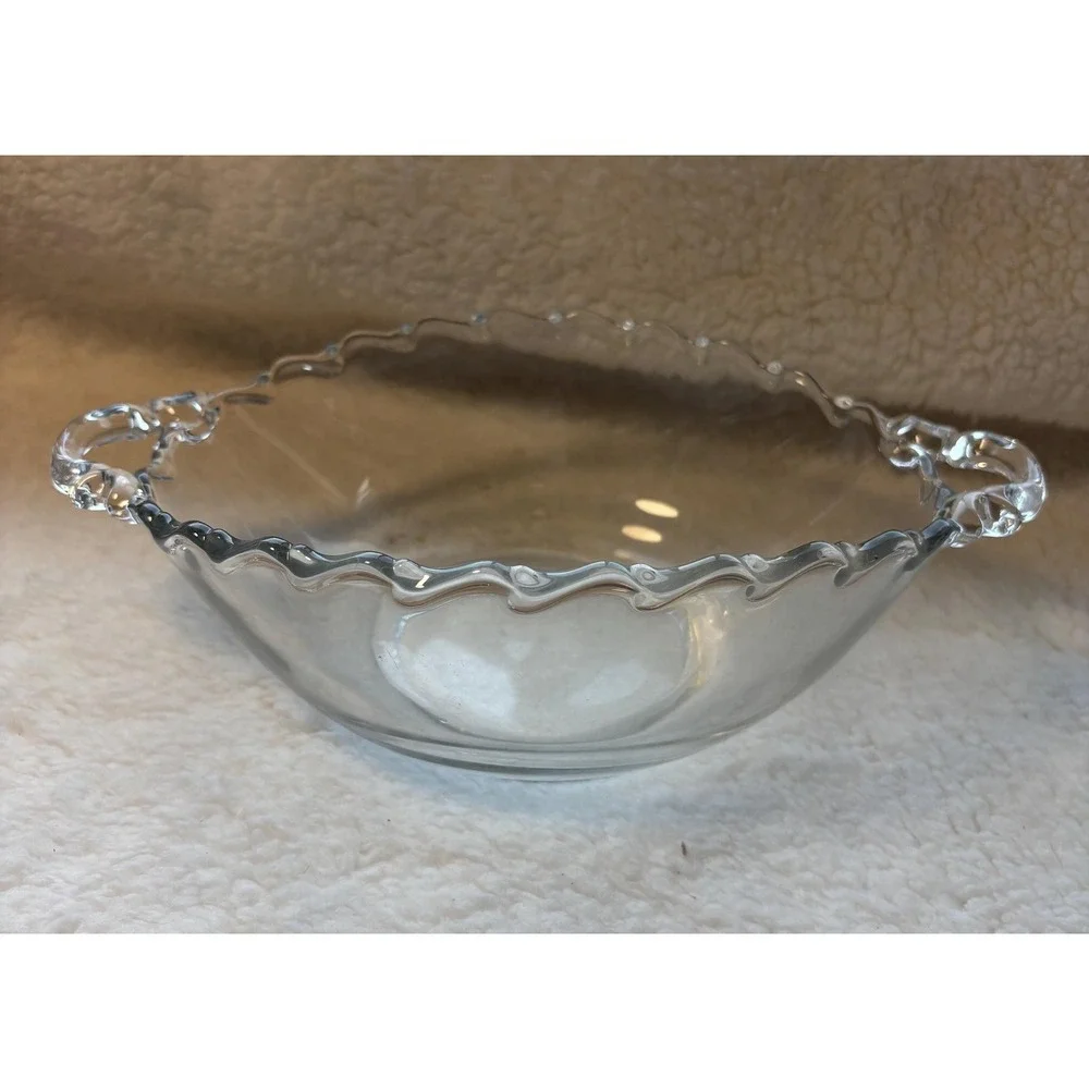 vintage clear glass item is a handled bowl from the Century pattern, mfct by